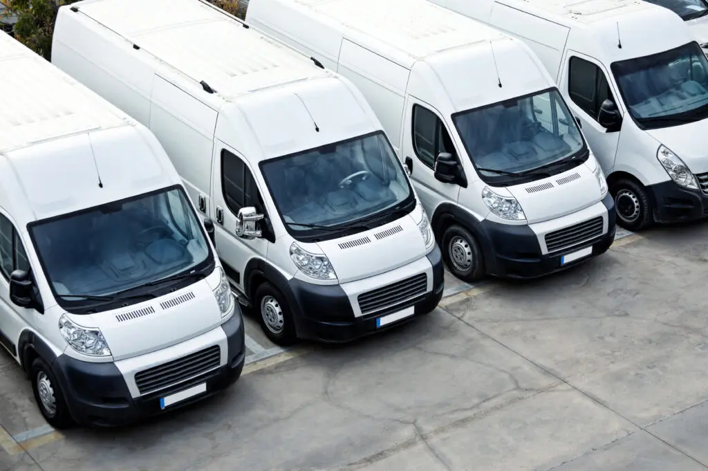 a row of white vans